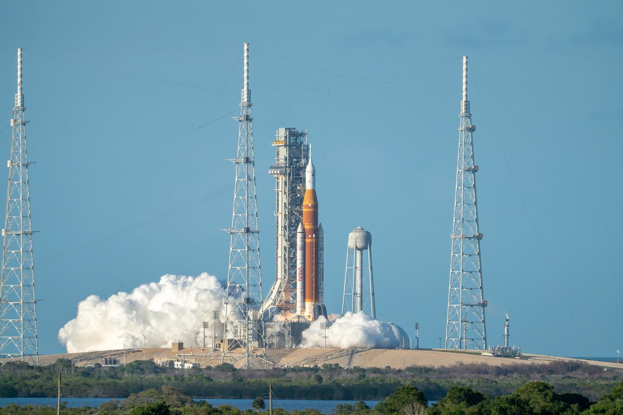 NASA SLS rocket lifting off — Artemis II